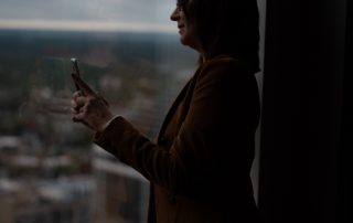 Lisa Carmichael facing a window